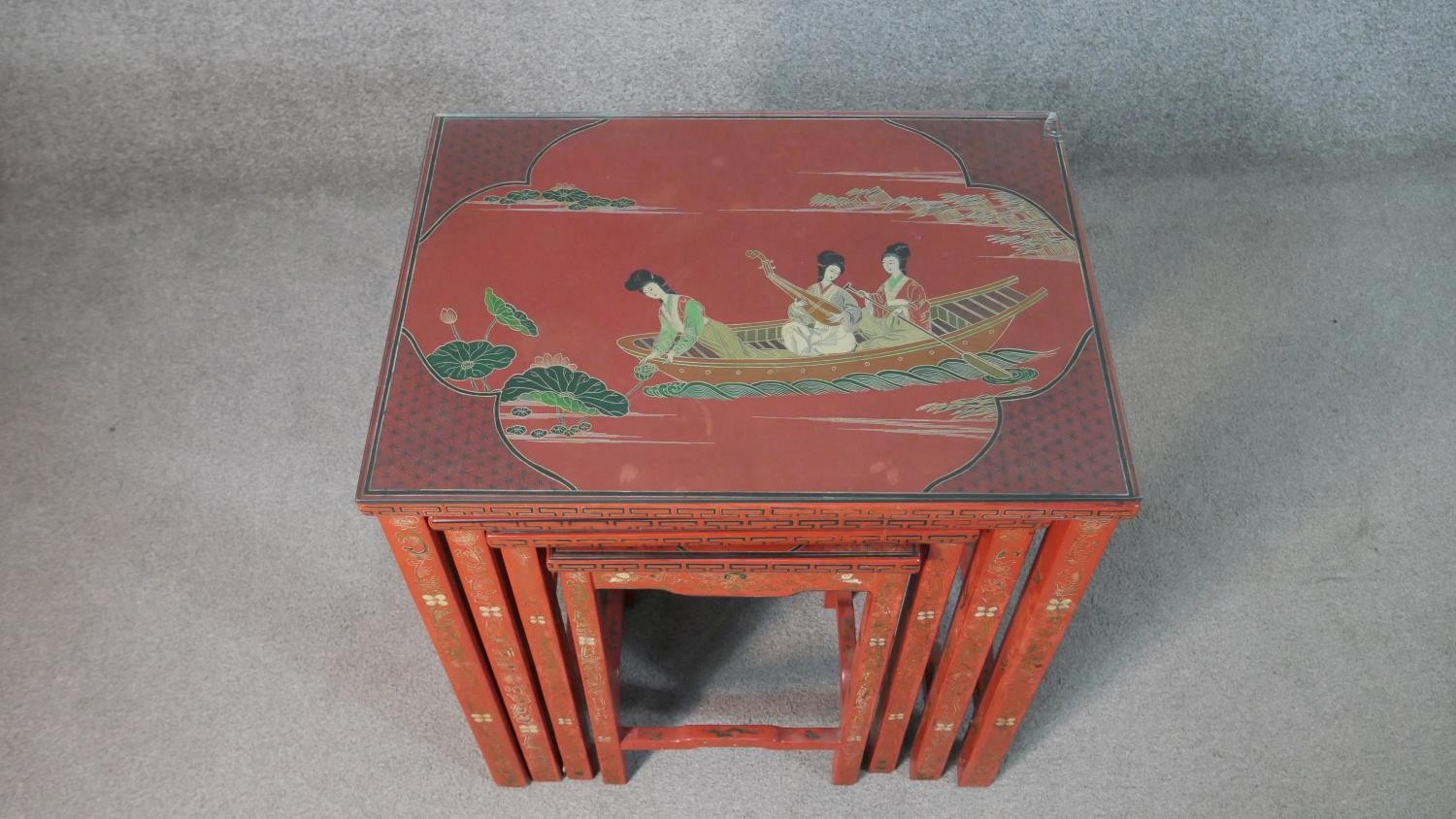 A quartetto of Chinese red lacquered occasional tables, of rectangular form, painted with figures in - Image 9 of 11