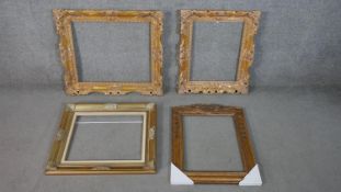 Four gilded moulded resin picture frames, some with foliate and floral motifs. H.79 W.69cm. (
