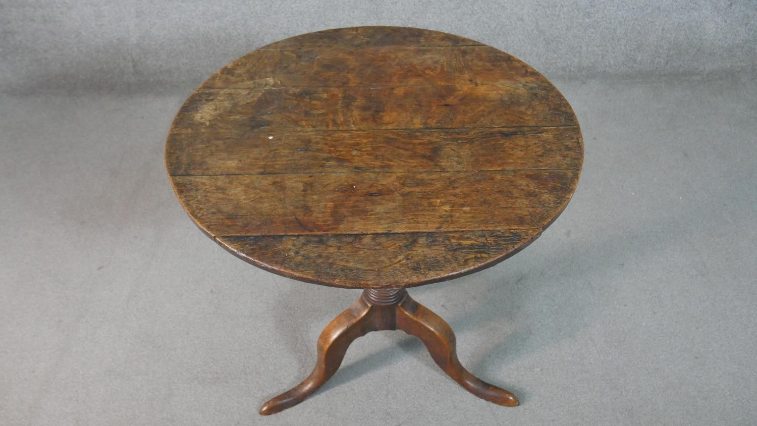 A 19th century country oak tilt top occasional table on tripod cabriole supports. H.72 Diam.71cm - Image 2 of 7