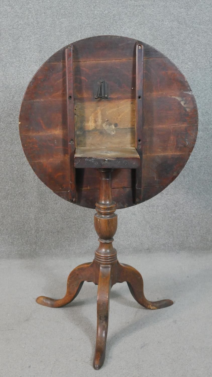 A 19th century country oak tilt top occasional table on tripod cabriole supports. H.72 Diam.71cm - Image 7 of 7