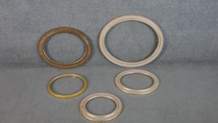 A collection of five oval and circular giltwood frames. H.41 W.51cm (largest)