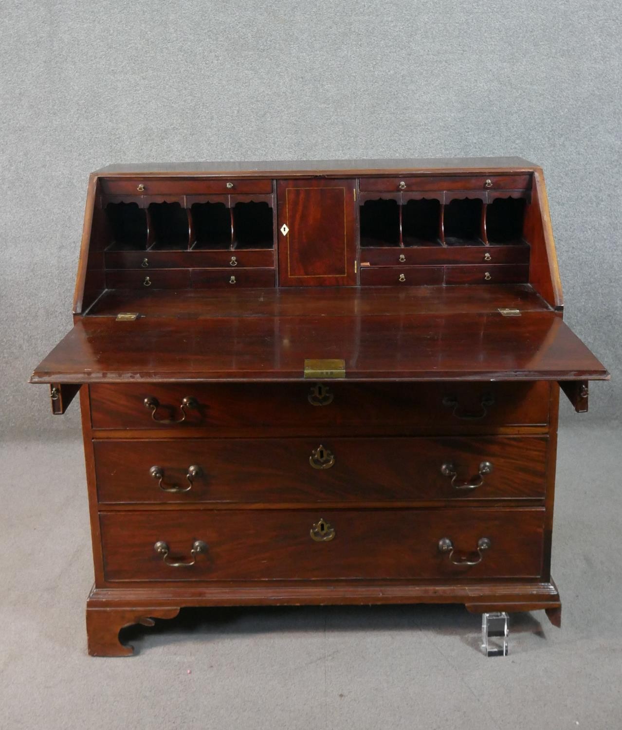 A George III mahogany bureau, the fall front opening to reveal a central cupboard door, drawers - Image 4 of 14