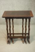 A reproduction Georgian style mahogany nest of three occasional tables, with rectangular tops on