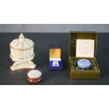 A collection of trinket boxes including, a pierced porcelain and hand gilded Oriental design