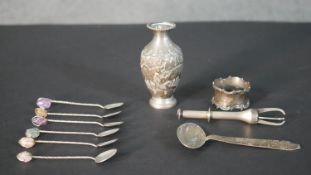 A collection of silver and silver plate, including a silver ice grabber, a silver napkin ring,