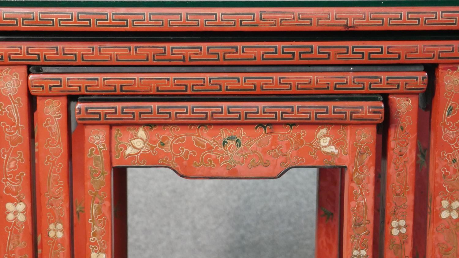 A quartetto of Chinese red lacquered occasional tables, of rectangular form, painted with figures in - Image 7 of 11