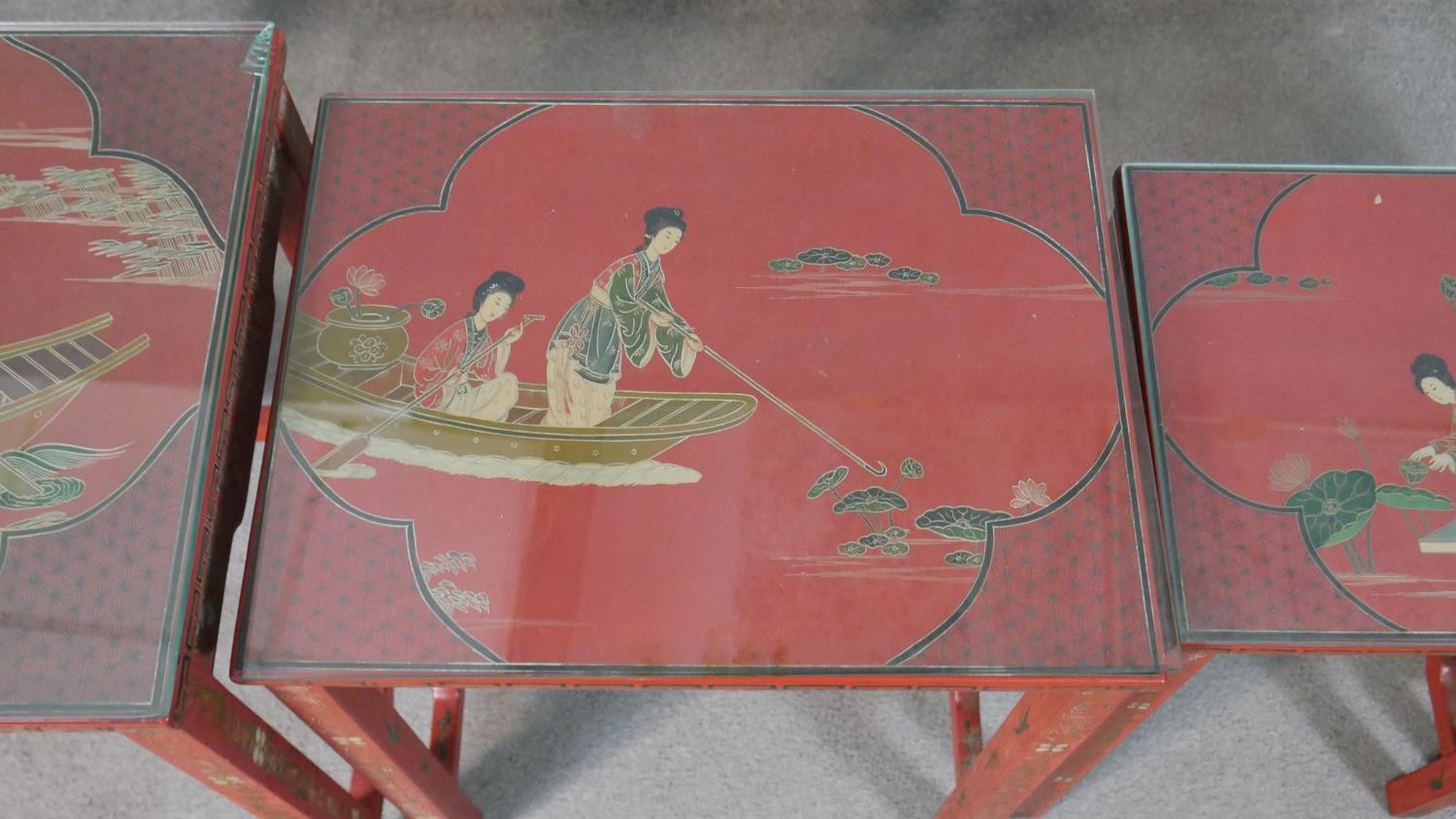 A quartetto of Chinese red lacquered occasional tables, of rectangular form, painted with figures in - Image 3 of 11