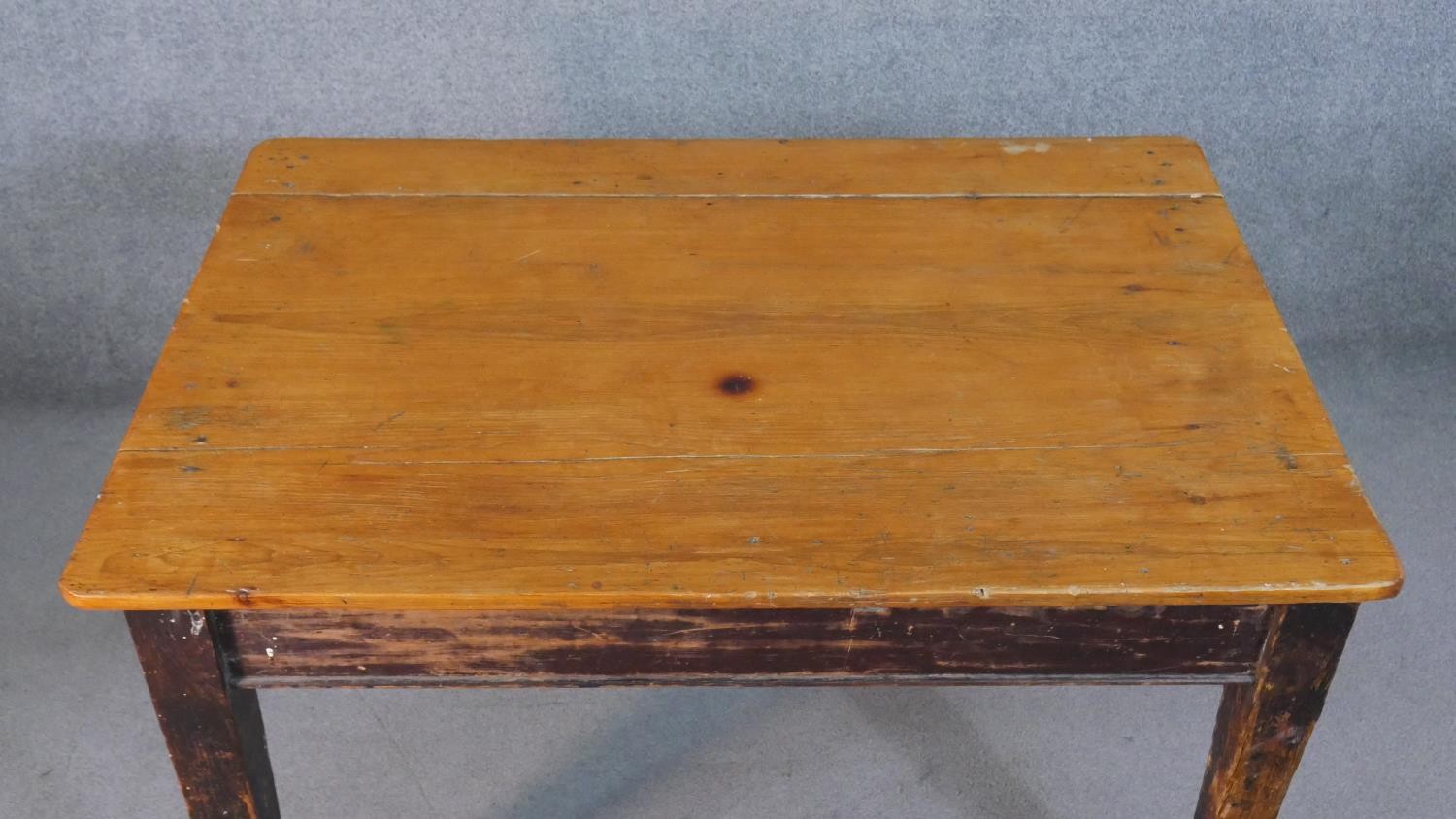 A C.1900 planked top kitchen table on distressed square section tapering supports. H.74 W.119 D.82cm - Image 6 of 8