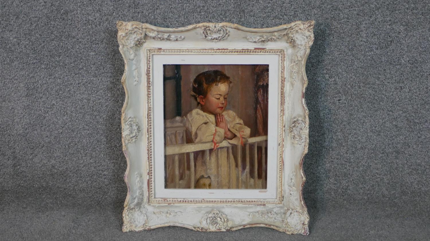 A carved framed oil on canvas of a child praying in her cot. Unsigned. H.47 W.43cm. - Image 2 of 7