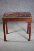 A circa 1920s Chinoiserie red painted coffee table, of rectangular form, the top decorated with