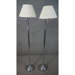K&L Belysning Co, Denmark, a pair of circa 1960s adjustable chrome reading lamps, with white pleated