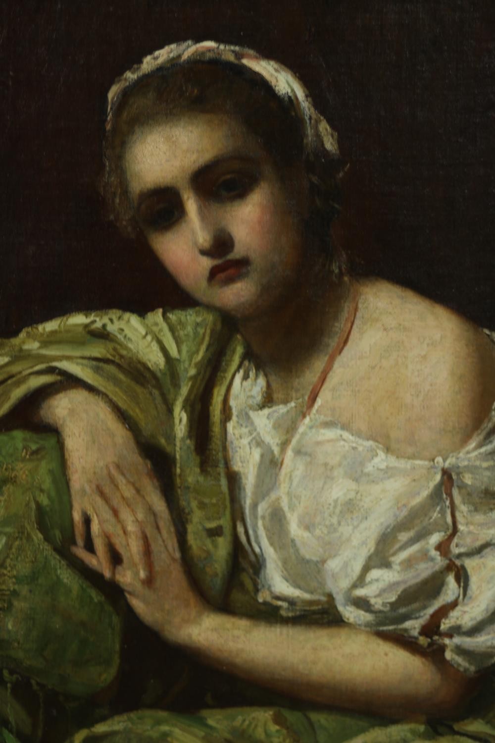 A carved gilt framed oil on board of a woman in a green shawl and white lace dress, unsigned. H.54