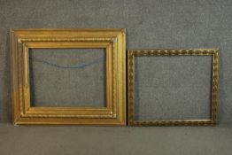 Two giltwood picture frames, one with repeating floral and foliate motifs. H.85 W.100cm. (largest)