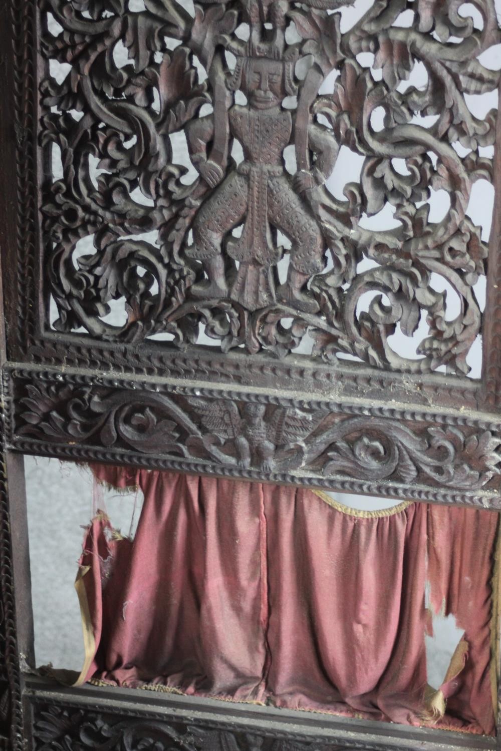 An ornately carved and pierced wood screen, possibly Burmese, of three folds, each with two panels - Image 5 of 7