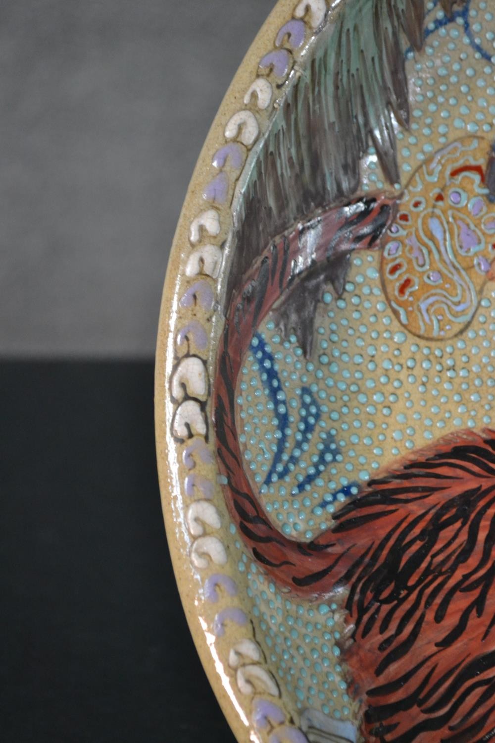 A Japanese 19th century Kutani ware bowl with an immortal riding a tiger, cloud motifs to the - Image 4 of 11