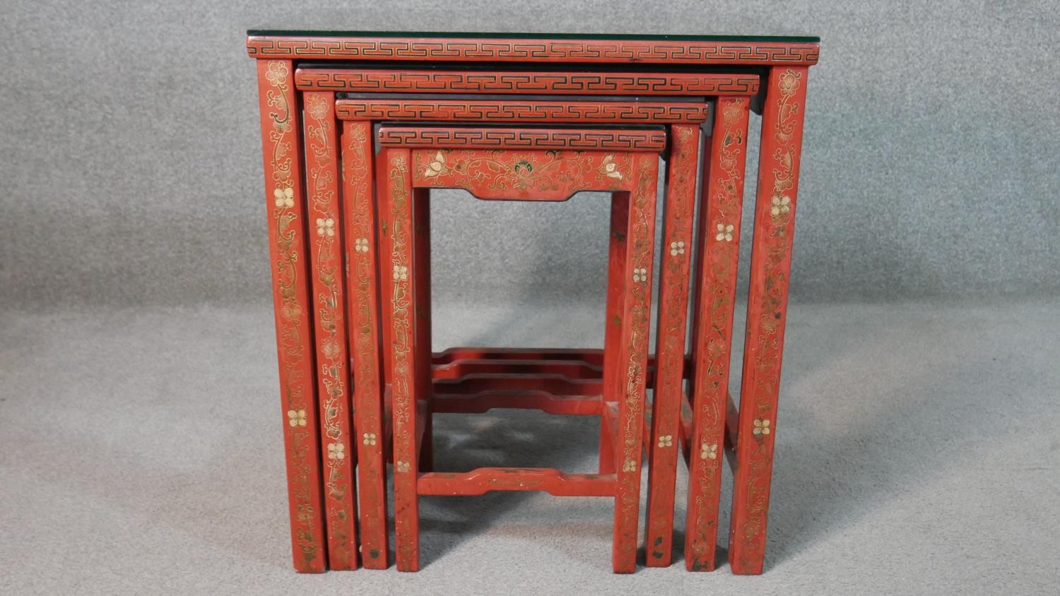 A quartetto of Chinese red lacquered occasional tables, of rectangular form, painted with figures in - Image 5 of 11