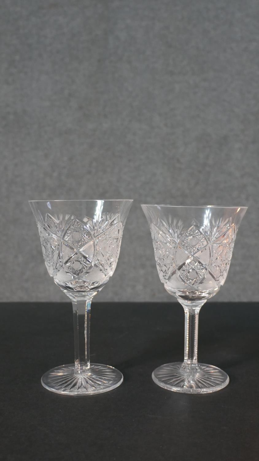 A set of seven hand cut sherry glasses with a star cut bases. H.17 Diam.10cm - Image 4 of 7