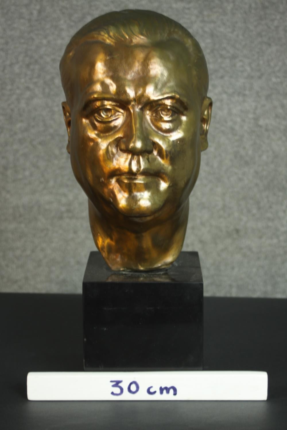 A 20th century bronze head of a gentleman, mounted on a black marble base. H.48 W.18 D.23cm. - Image 2 of 5