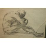 A framed and glazed charcoal drawing of a seated nude. Unsigned. (cracked glass) H.45 W.57cm.