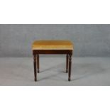 A Victorian style stool, upholstered in golden velour, on turned and reeded legs. H.52 W.51 D.35cm