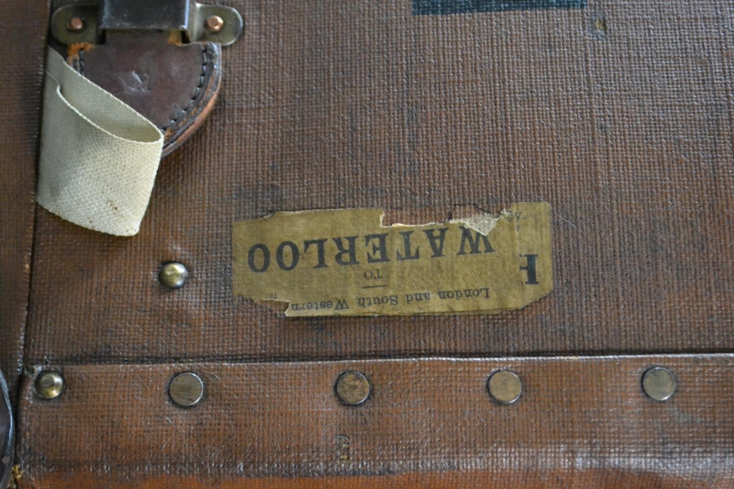 An early 20th century brown travel trunk, with wood bracing and brown leather corners. (locked) H.42 - Image 7 of 7