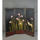 A gilded and lacquered silk embroidered three fold Japanese screen, one side decorated with pink