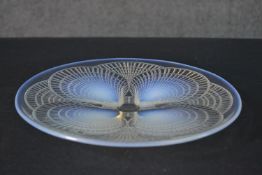 Rene Lalique, a Coquilles pattern opalescent glass dish, engraved R. Lalique, France. H.4 Diam.27cm