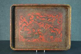 A Chinese carved lacquered tray decorated with stylised birds and flowers. H.4 W.42 D.41cm
