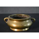 A Chinese bronze censer with apocryphal six character Xuande period mark to base. H.7 W.18cm