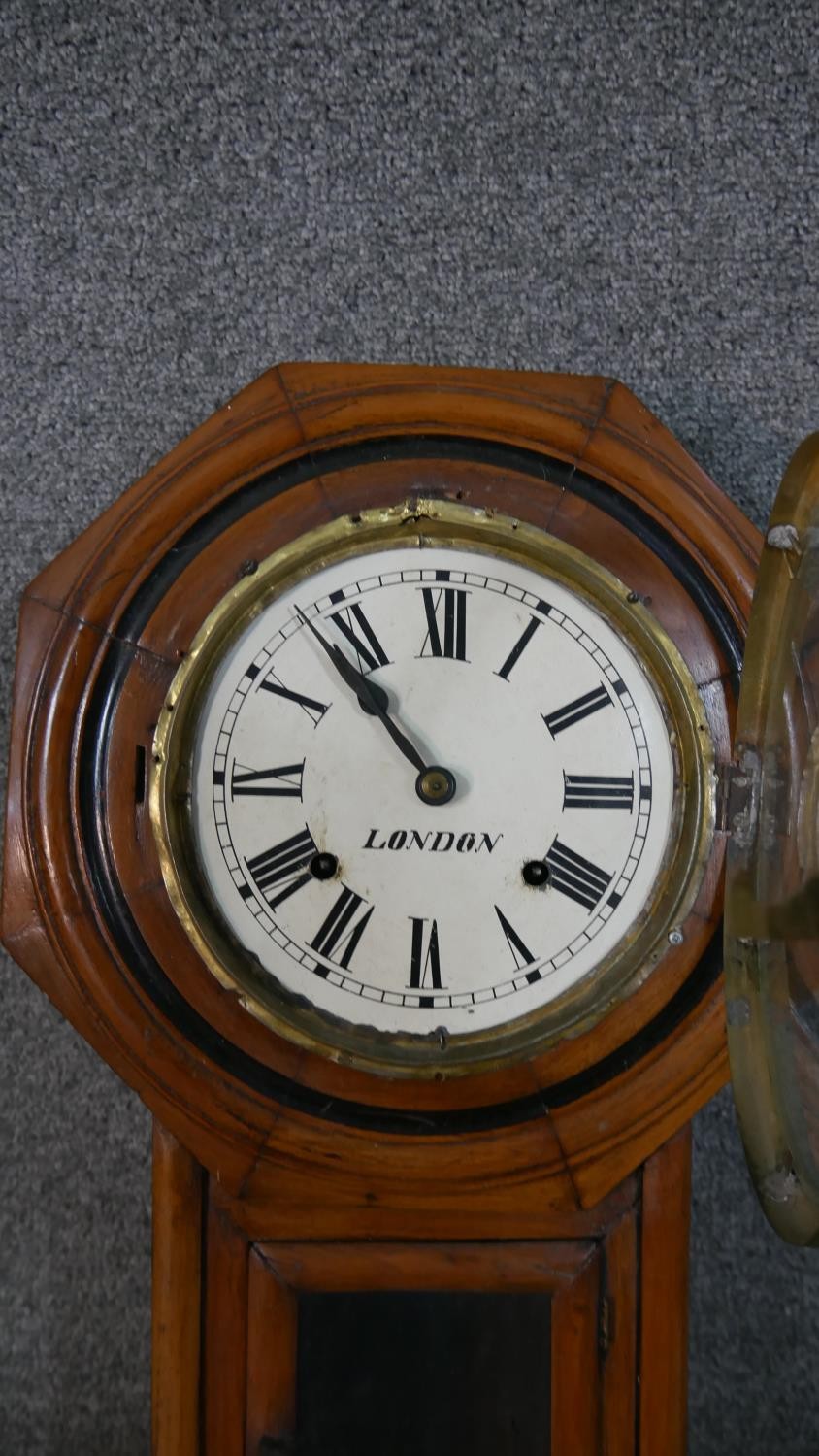A late 19th century wall clock, the circular painted dial in an octagonal frame, with Roman - Image 3 of 9