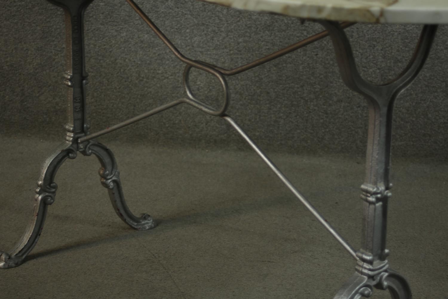An Italian marble topped cast iron table, the top with rounded ends, on cast end supports, joined by - Image 7 of 8