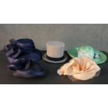 A collection of five vintage hats, including a Wegener grey top hat with black silk ribbon and