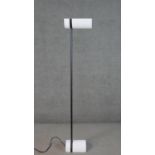 Thorn Lighting, Germany, a circa 1980s EMI uplighter lamp, with a white half cylinder shade and