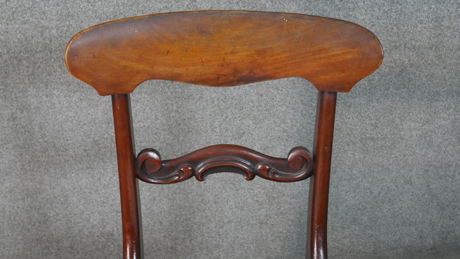 A set of four mid Victorian mahogany bar back dining chairs with drop in seats above turned tapering - Image 4 of 10