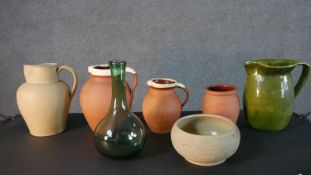 A collection of studio pottery and art glass, including three Royal Barum Ware graduated