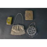 A collection of Edwardian coin purses and wallets, including a silver plate chain mail bag with blue