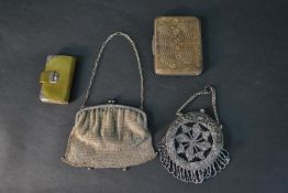 A collection of Edwardian coin purses and wallets, including a silver plate chain mail bag with blue