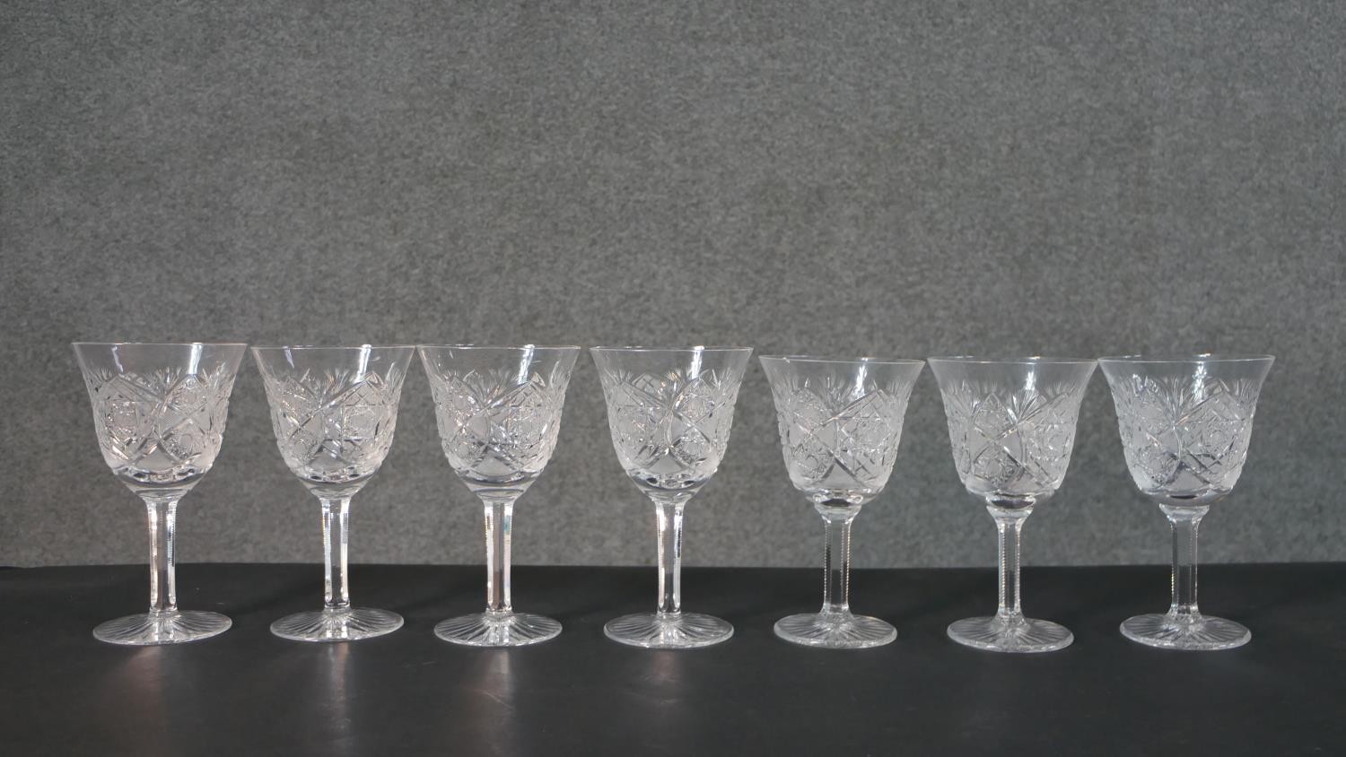 A set of seven hand cut sherry glasses with a star cut bases. H.17 Diam.10cm - Image 2 of 7