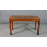 A Brights of Nettlebed reproduction figured walnut coffee table, in 18th century style, of