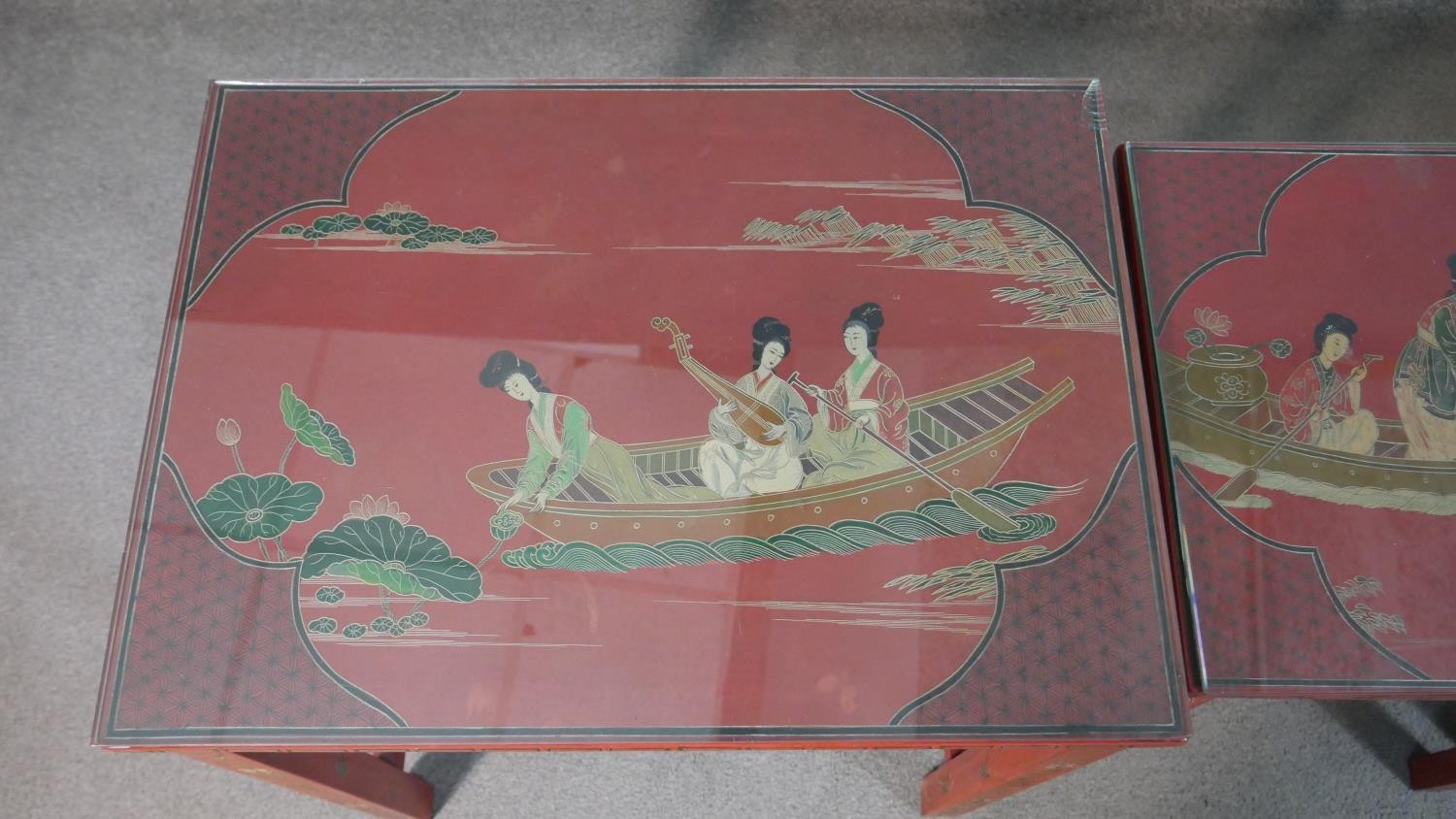 A quartetto of Chinese red lacquered occasional tables, of rectangular form, painted with figures in - Image 2 of 11