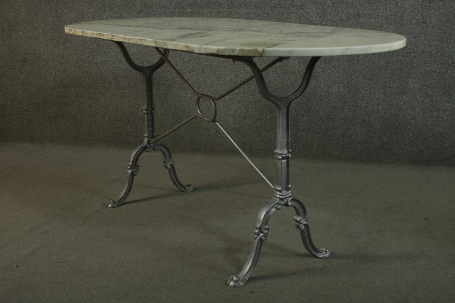 An Italian marble topped cast iron table, the top with rounded ends, on cast end supports, joined by - Image 6 of 8