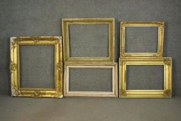 A collection of five giltwood and gesso picture frames. H.95 W.80cm. (largest) (interior. 56cm)