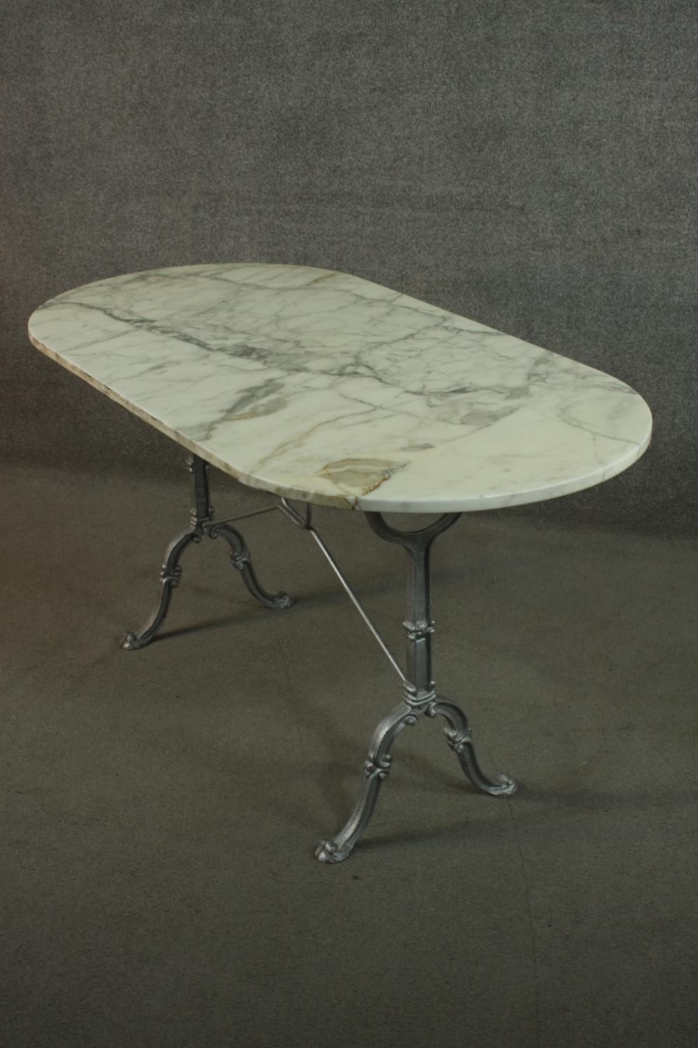 An Italian marble topped cast iron table, the top with rounded ends, on cast end supports, joined by - Image 5 of 8
