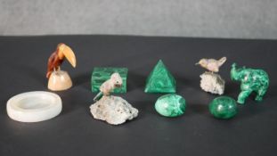 A collection of carved and polished malachite items along with three mineral and gemstone birds. H.8