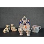 A collection of ceramics and porcelain, including a pair of Staffordshire pottery spaniels, a