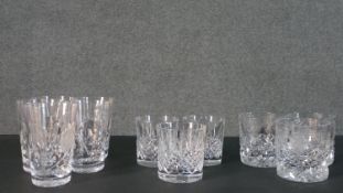 A collection of eleven cut crystal glasses, including a set of three Edinburgh crystal whisky