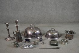 A collection of pewter and silver plate, including a pair of Victorian silver plated candlesticks, a