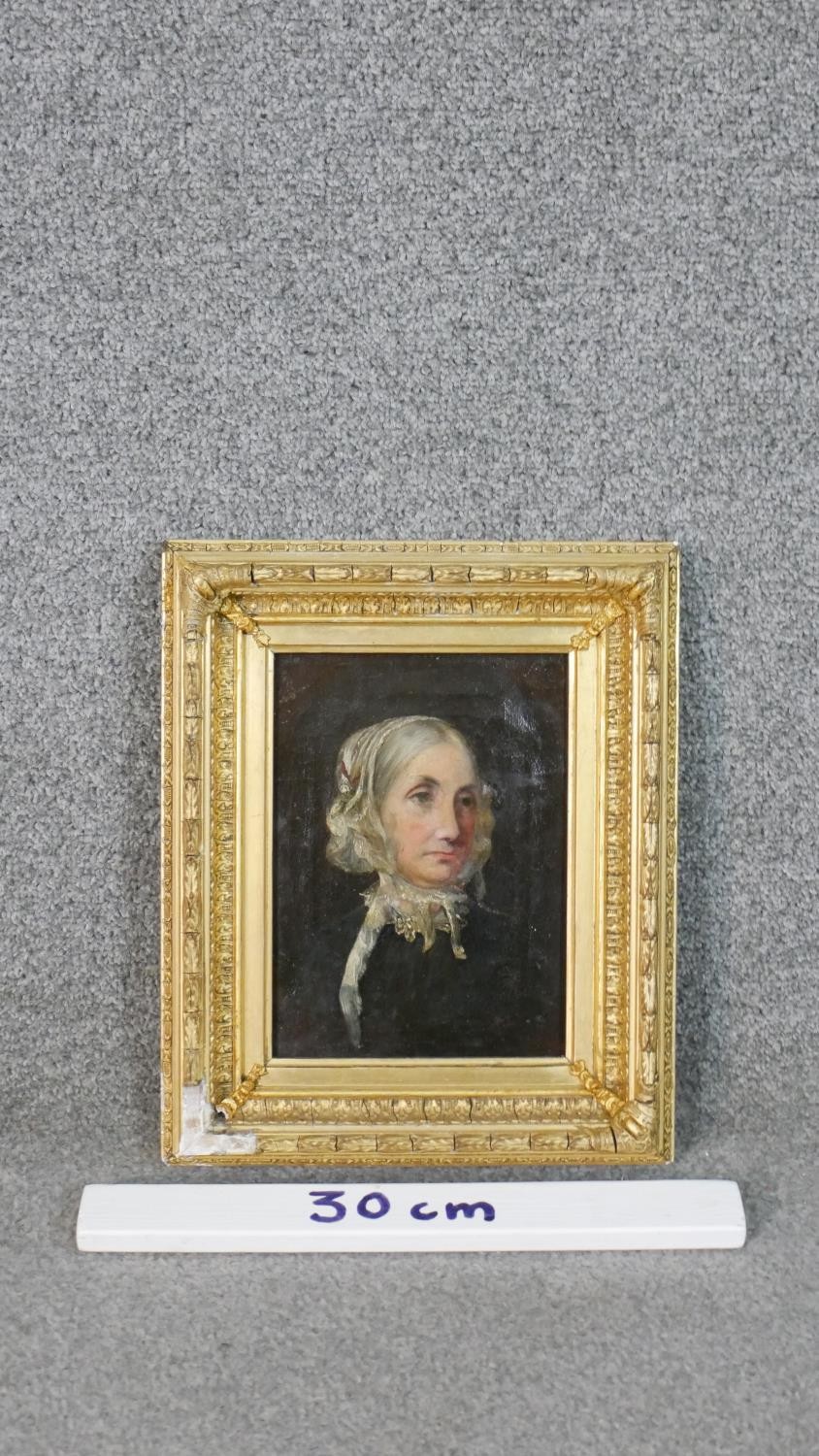 A carved giltwood framed oil on canvas portrait of an elderly lady in a lace collar. Unsigned. H. - Image 3 of 7