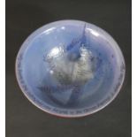 A terracotta blue glaze art pottery bowl, around the rim a hand written quote by Marcel Proust.