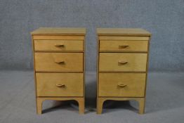 A pair of late 20th century birch veneered plywood bedside chests, probably Scandinavian, with three